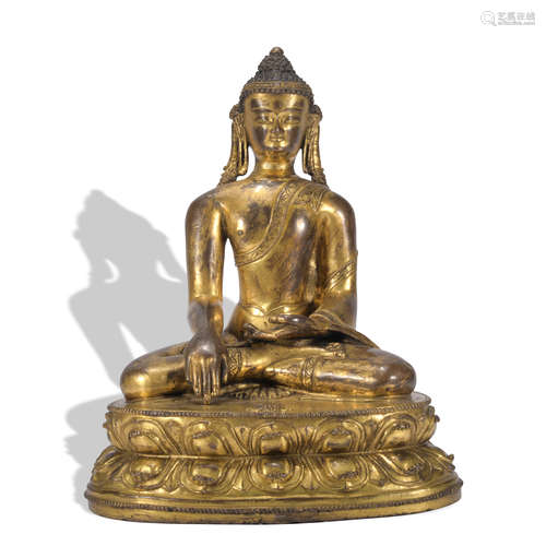 A gilt-bronze statue of Sakyamumi