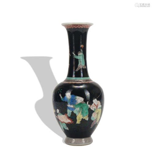 A black glazed 'figure' vase