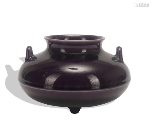 A purple glazed vase