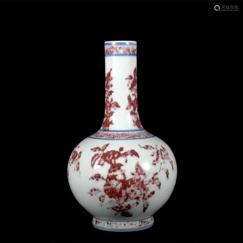 A copper-red-glazed 'floral' globular vase