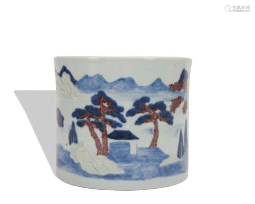 An underglaze-blue and copper-red 'landscape' pen container