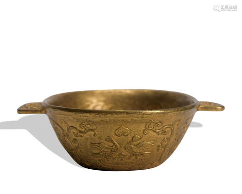 A gilt-bronze washer