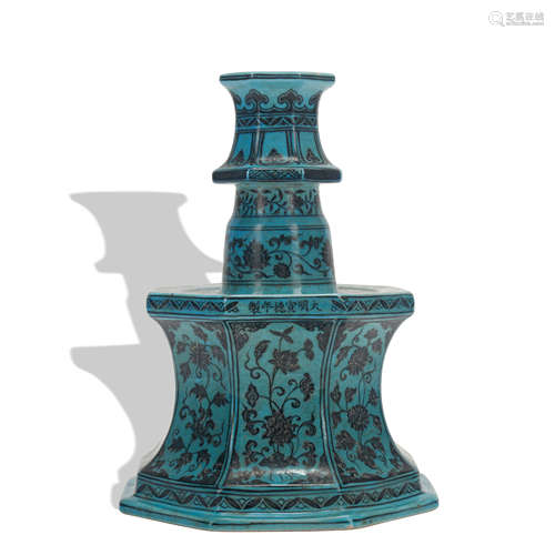 A peacock blue glazed vase