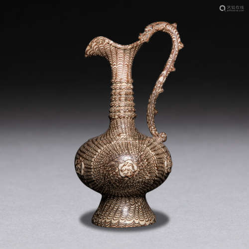 Tang Dynasty of China
Stirring glaze dragon handle flow pot