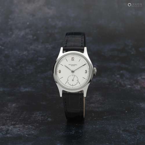 Patek Philippe. A fine and rare stainless steel manual wind ...