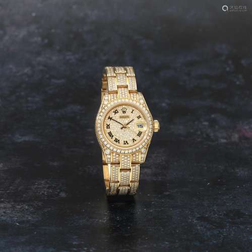 Rolex. A fine lady's 18K gold and diamond set automatic cale...