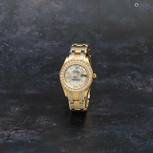 Rolex. A lady's 18K two colour gold and diamond set automati...