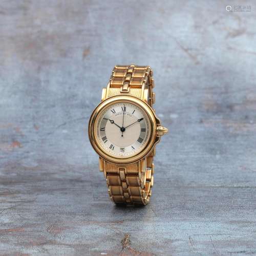 Breguet. A fine 18K gold automatic calendar bracelet watch