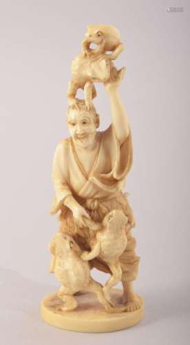 A SMALL JAPANESE CARVED IVORY FIGURE OF A MAN WITH FROGS, ma...