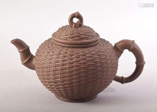 A GOOD CHINESE YIXING TEAPOT, with basket weave decoration, ...
