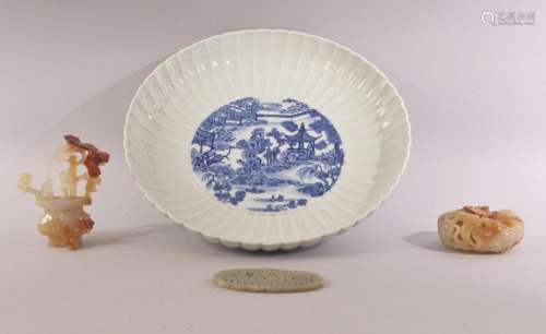 A MIXED LOT WITH A CHINESE BLUE AND WHITE RIBBED PORCELAIN D...