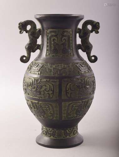 A CHINESE ARCHAIC STYLE TWIN HANDLE BRONZE VASE, 28cm high.