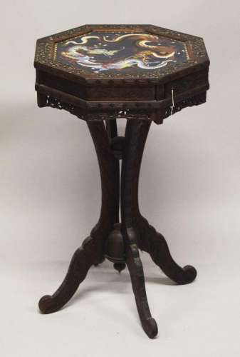 AN UNUSUAL CHINESE OCTAGONAL CARVED HARDWOOD PEDESTAL TABLE,...