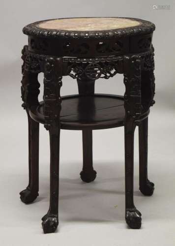 A LARGE AND IMPRESSIVE CHINESE HARDWOOD MARBLE TOP URN STAND...