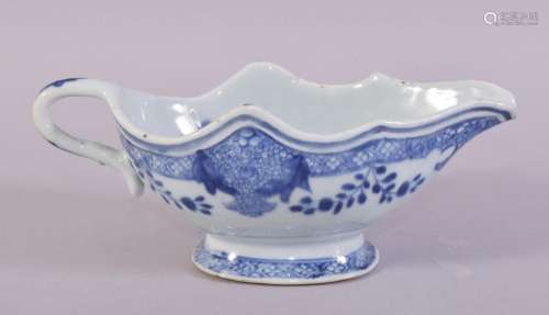 A CHINESE BLUE AND WHITE PORCELAIN SAUCE BOAT, the interior ...