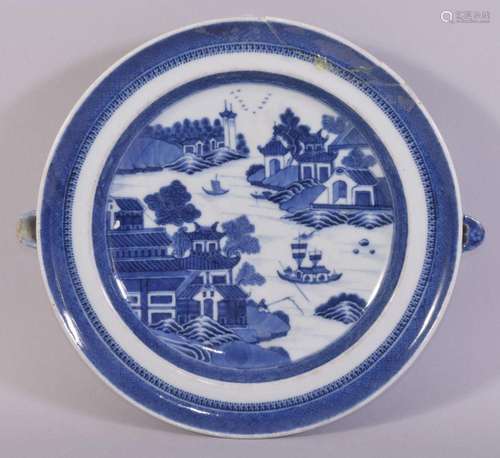 A CHINESE BLUE AND WHITE PORCELAIN WARMING DISH, painted wit...