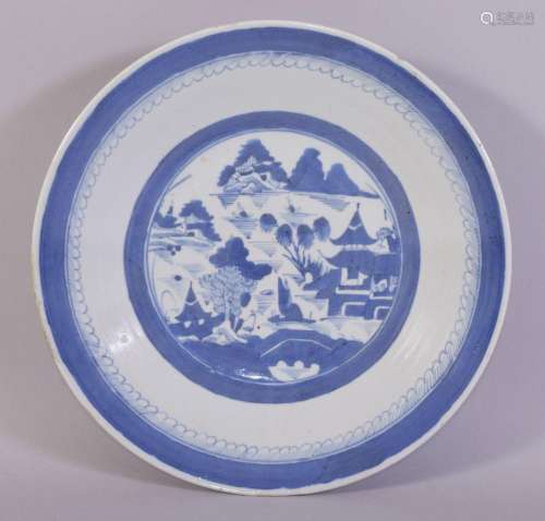 A CHINESE BLUE AND WHITE PORCELAIN DISH, the centre with a r...
