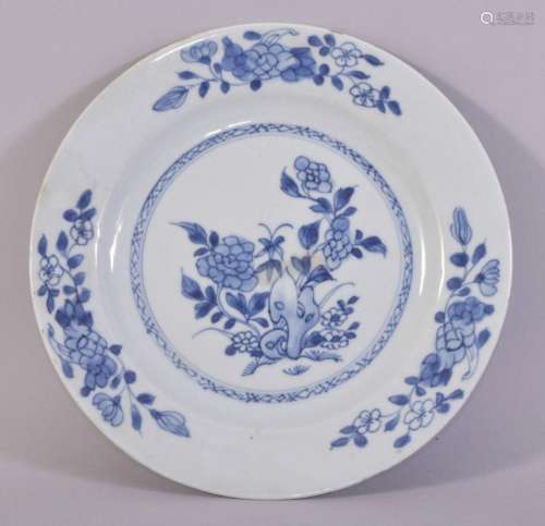 A CHINESE BLUE AND WHITE PORCELAIN DISH, painted with flower...
