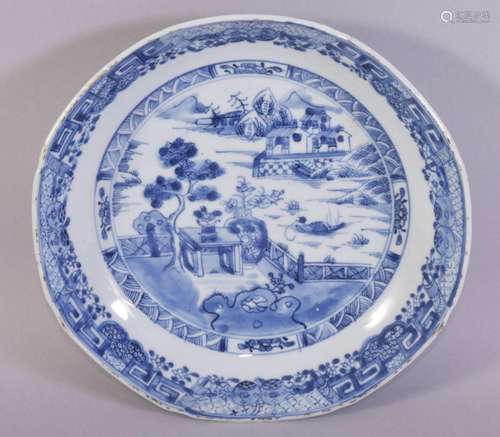 A CHINESE BLUE AND WHITE PORCELAIN DISH, the centre painted ...