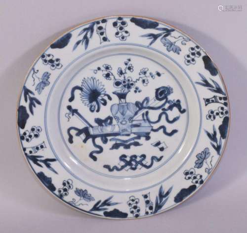 A CHINESE BLUE AND WHITE PORCELAIN DISH, the centre painted ...