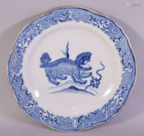 A CHINESE BLUE AND WHITE PORCELAIN DISH, the centre painted ...