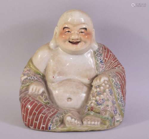 A CHINESE FAMILLE ROSE PORCELAIN FIGURE OF BUDDHA, with impr...