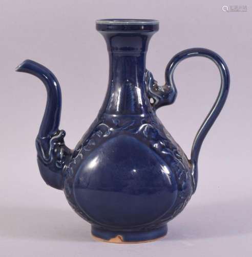 A CHINESE POWDER BLUE GLAZE WINE EWER, decorated with scroll...
