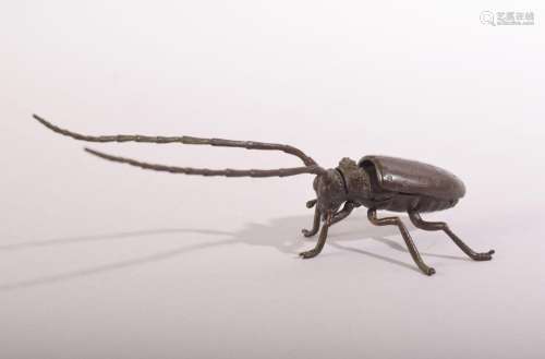 A JAPANESE BRONZE MODEL OF A LONG HORNED BEETLE - articulate...