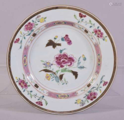 A CHINESE FAMILLE ROSE PORCELAIN PLATE, painted with flowers...