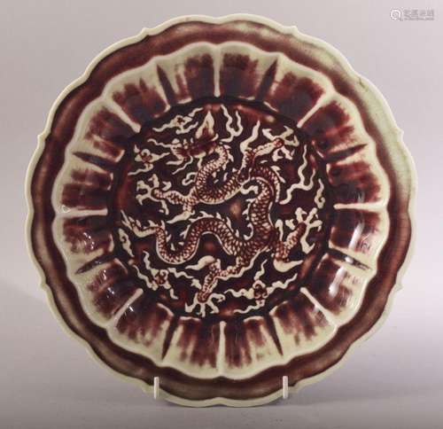 A CHINESE OX BLOOD / FLAMBE MING STYLE PORCELAIN DRAGON DISH...