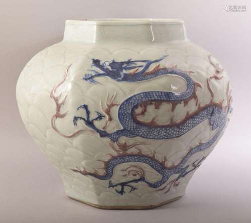 A CHINESE MING STYLE CELADON & IRON RED CARVED PORCELAIN...