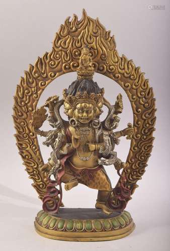 A TIBETAN GILT BRONZE FIURE OF MULTI ARM BUDDHA- with poly c...