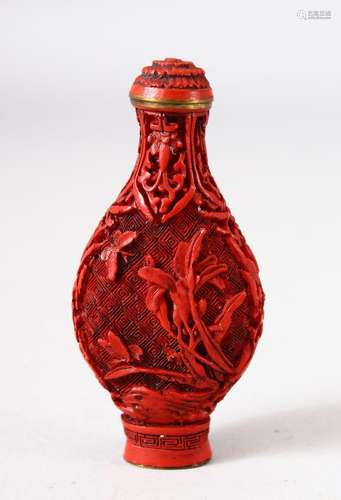 A CINNABAR LACQUER SNUFF BOTTLE, 7.5cm.