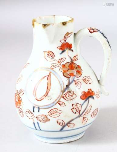 A JAPANESE ARITA PORCELAIN OIL JUG / EWER, painted with flow...