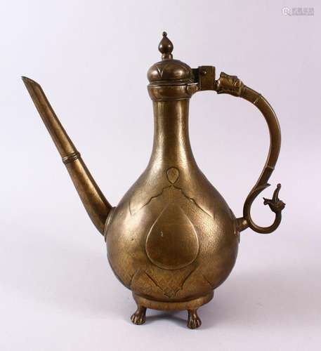 A LARGE 18TH CENTURY MUGHAL INDIAN BRASS EWER, 38cm high.