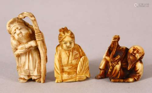 THREE JAPANESE MEIJI PERIOD CARVED IVORY NETSUKE - one depic...