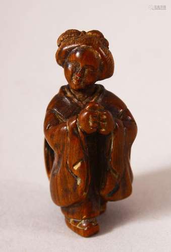 A JAPANESE MEIJI PERIOD CARVED WOOD NETSUKE OF A LADY - The ...