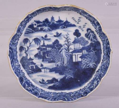 A CHINESE BLUE AND WHITE PORCELAIN TRAY, painted with a rive...