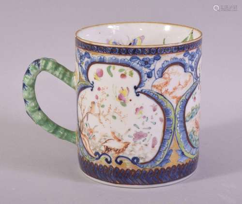 A CHINESE CLOBBERED PORCELAIN MUG / TANKARD, painted with th...