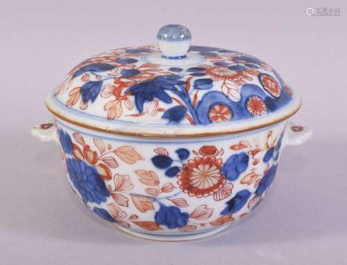 A JAPANESE IMARI PORCELAIN ECUELLE AND COVER, decorated in t...