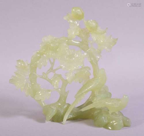 A CHINESE JADE CARVING OF PHEASANTS and blossoms, 16cm high,...