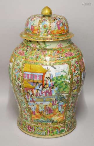 A LARGE CHINESE CANTON URN AND COVER, painted with panels of...