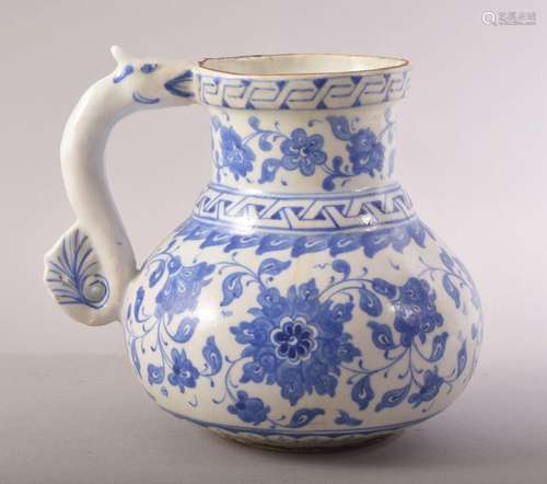 A TURKISH OTTOMAN IZNIK BLUE AND WHITE MASRAPA WATER JUG, pa...