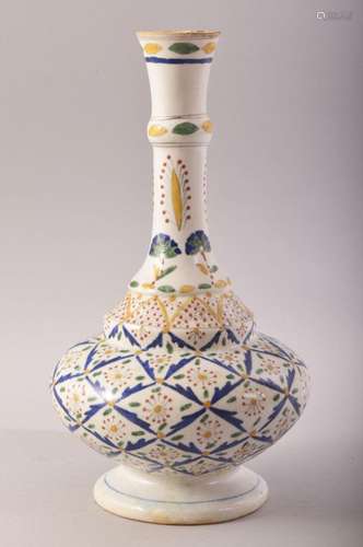 A TURKISH OTTOMAN KUTAHYA GLAZED POTTERY VASE, decorated wit...