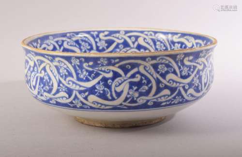 A TURKISH OTTOMAN IZNIK BLUE AND WHITE GLAZED POTTERY BOWL, ...