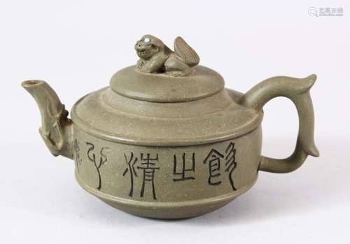 A CHINESE YIXING CLAY TEAPOT & COVER - decorated with ca...