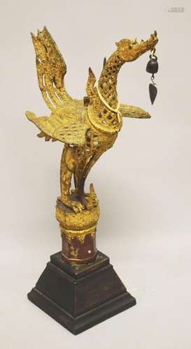 A 19TH CENTURY BUDDHIST GILT BRONZE FIGURE OF A HONGSA BIRD,...