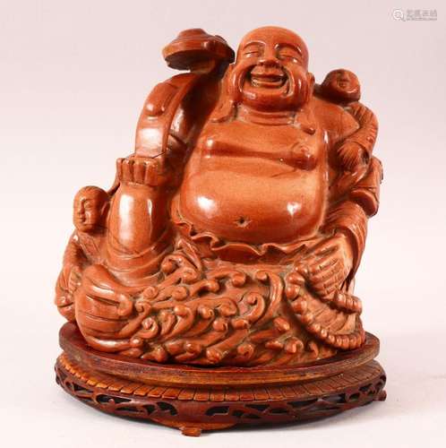 A SUPERB CHINESE HARD STONE CARVING OF BUDDHA holding a scep...