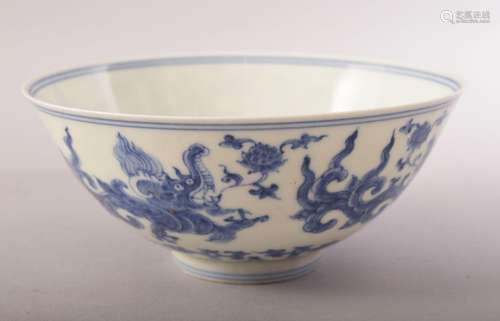 A CHINESE BLUE AND WHITE PORCELAIN BOWL, painted with mythol...