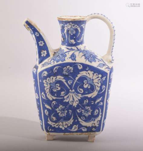 A SMALL TURKISK BLUE AND WHITE KUTAHYA WATER JUG, with spray...